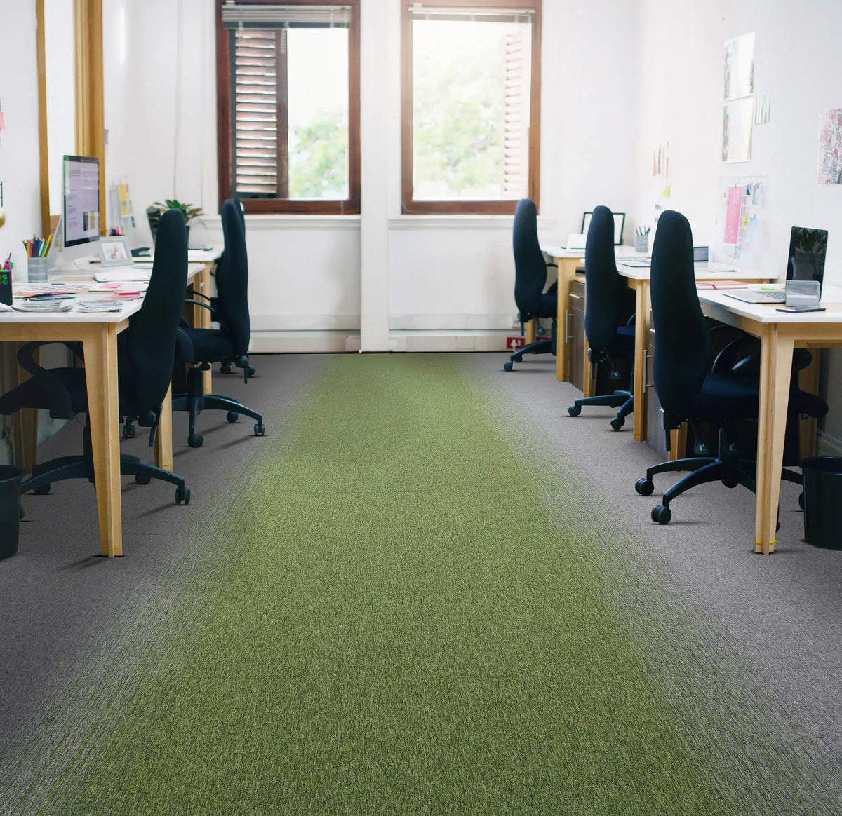 Burmatex Tivoli Mist carpet tiles in green and grey forming a walkway in an open plan office