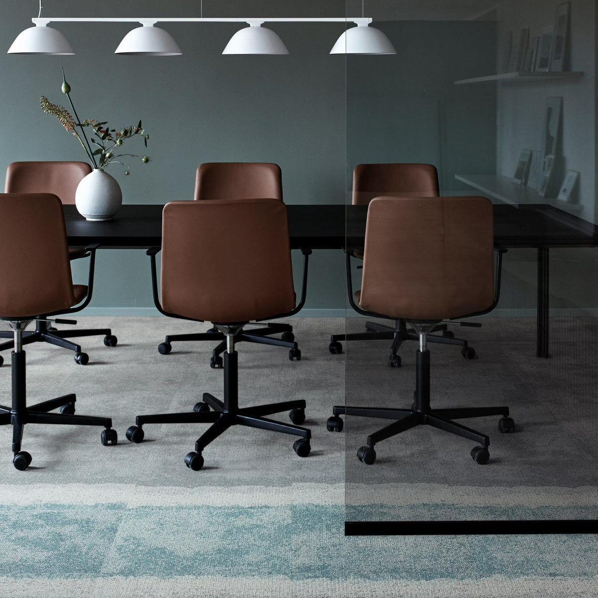 Interface Composure Edge carpet tiles in Wave/Isolation with Composure Wave and Isolation in a meeting room