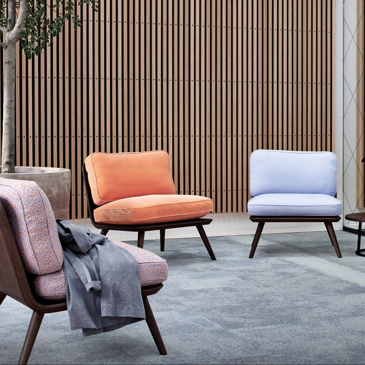 Interface Composure carpet tiles in Pewter and Isolation with Composure Edge and Level Set LVT in a lounge area