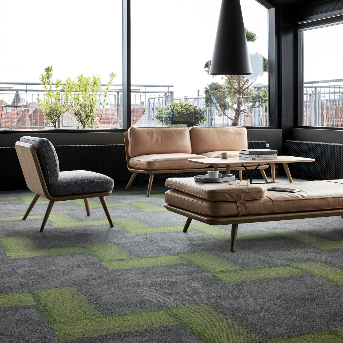Interface Composure carpet tiles in Seclusion with Composure Edge Olive/Seclusion in a lounge area