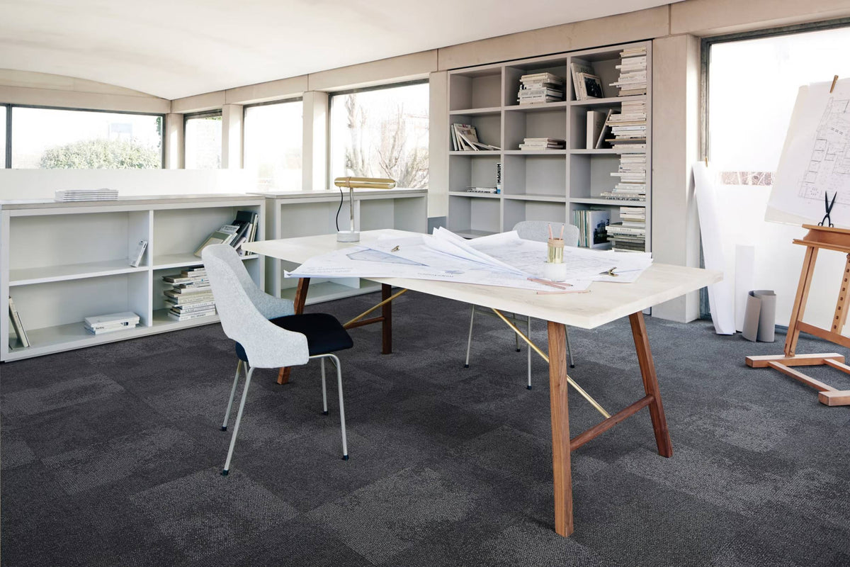 Interface Composure carpet tiles in Solitude in a design studio