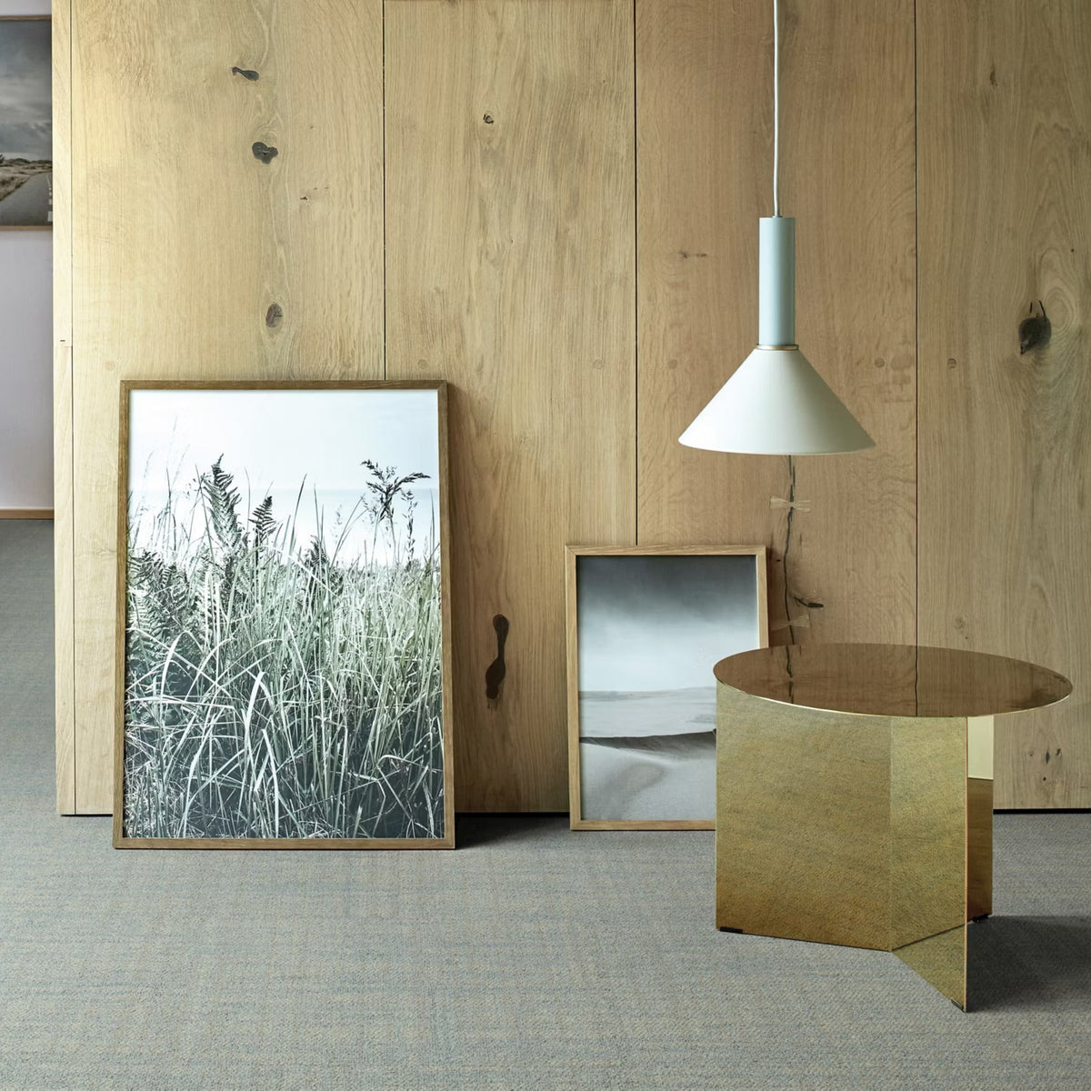 Interface Contemplation carpet tiles in Homespun laid in a brick pattern beside an oak-panelled wall