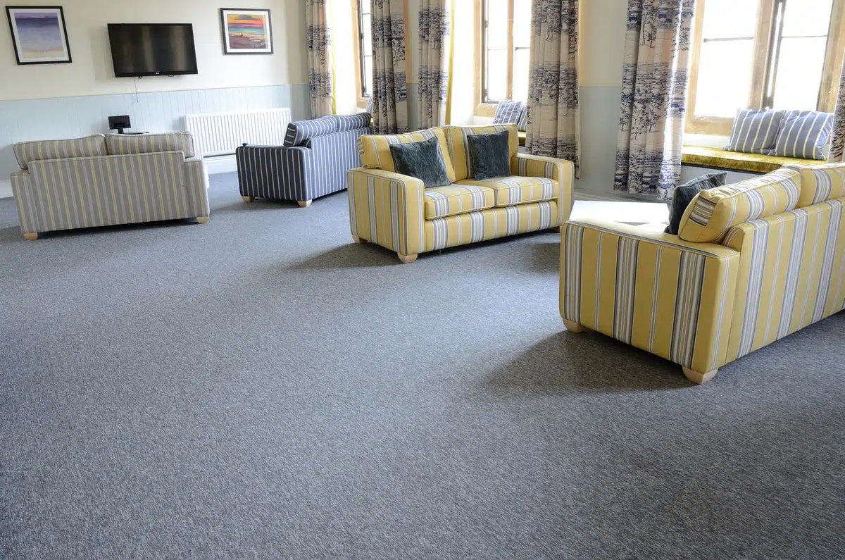 Tivoli® loop pile carpet tiles in the Lancing College common room - installation example for Tivoli® Carpet Tiles in Volcanic Flame